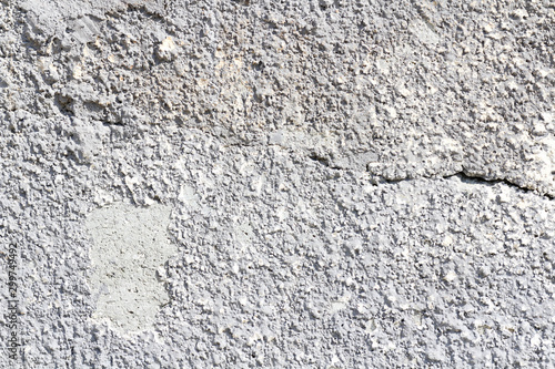 Concrete wall texture background. Natural stones. Building s facade decor. Decorative plaster. House exterior. 