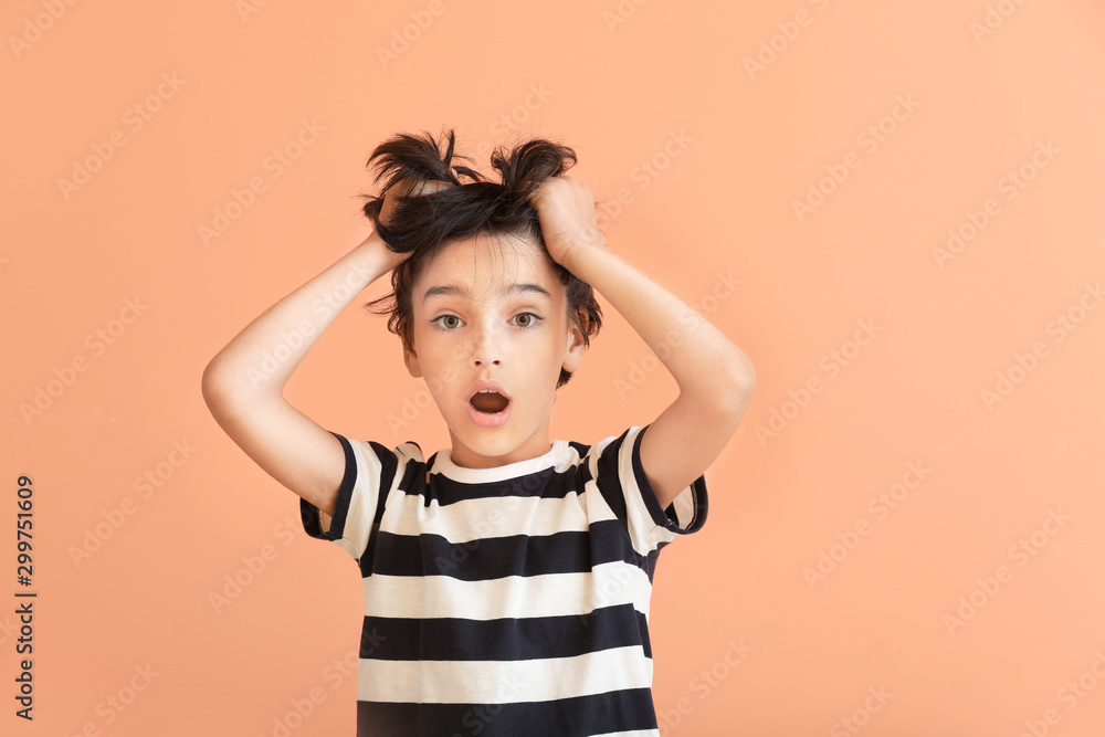 Surprised little boy on color background Surprised little boy on color background