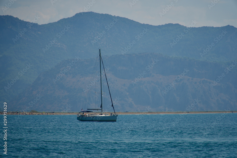 sailing yacht anchored in the open sea