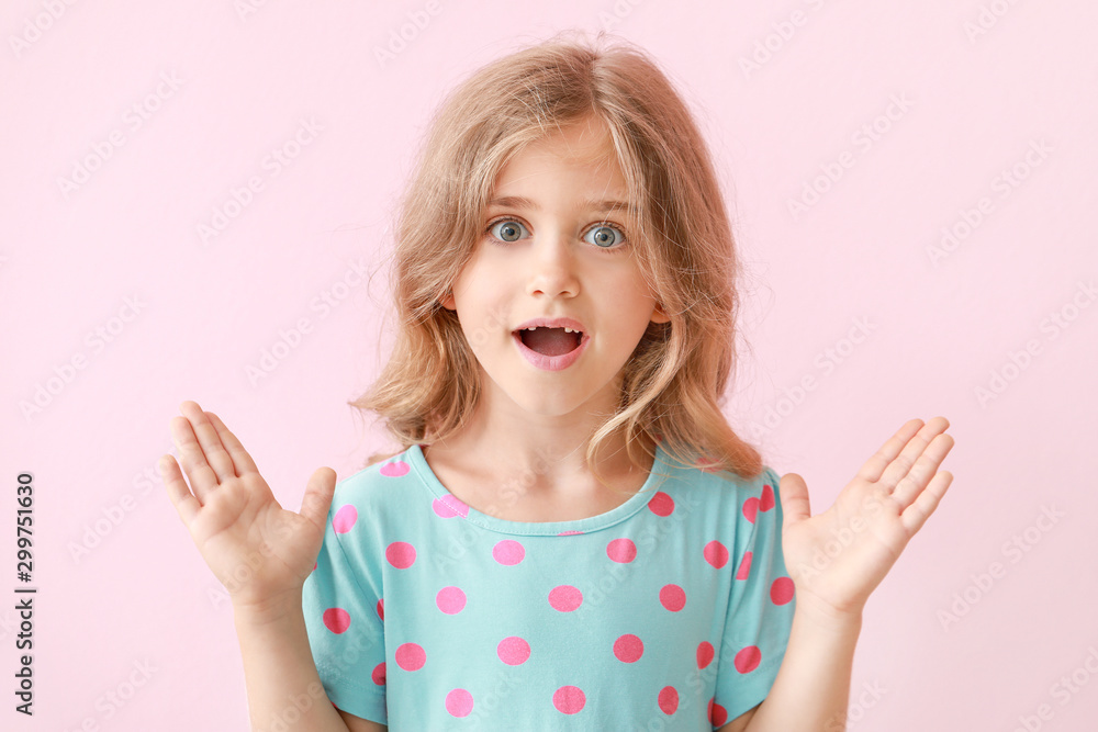 Surprised little girl on color background Surprised little girl on color background