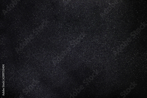 Starry night sky background. Millions of stars on a black background.