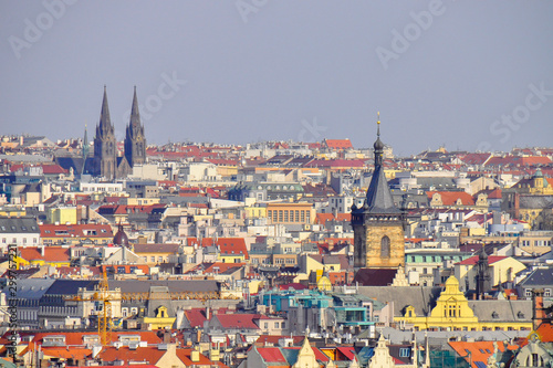 Panoramic view of Old Town in Prague in a beautiful summer day. Top view to colorful roofs skyline of capital city Prague, Czech republic. 