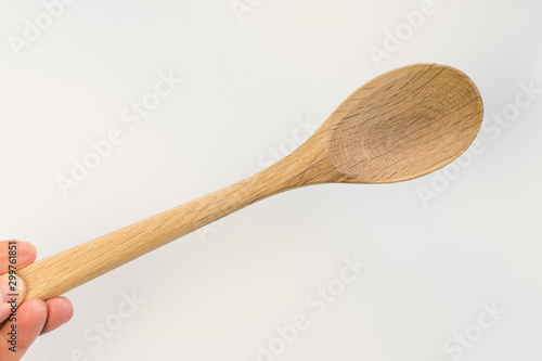 Traditional wooden spoon isolated on white background