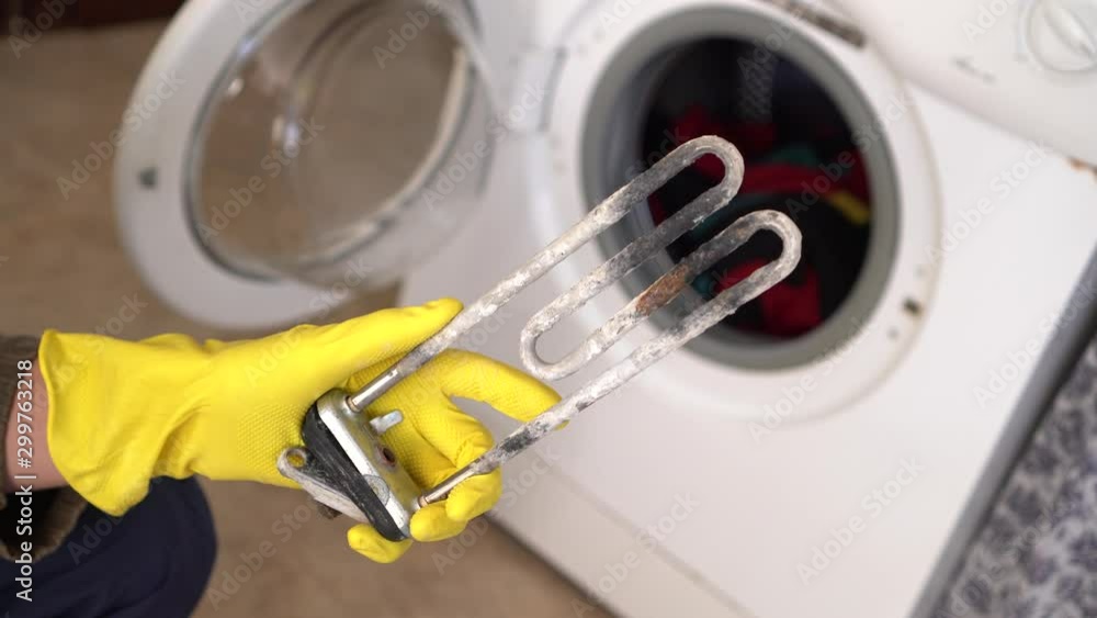 Video Stock Treatment of Calcium Deposits in Water Heater. Limescale on