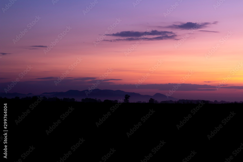 Fototapeta premium Silhouette of mountain and the pink sky in the morning
