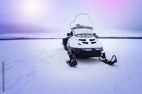 snowmobile on a winter lake, a place for the text.