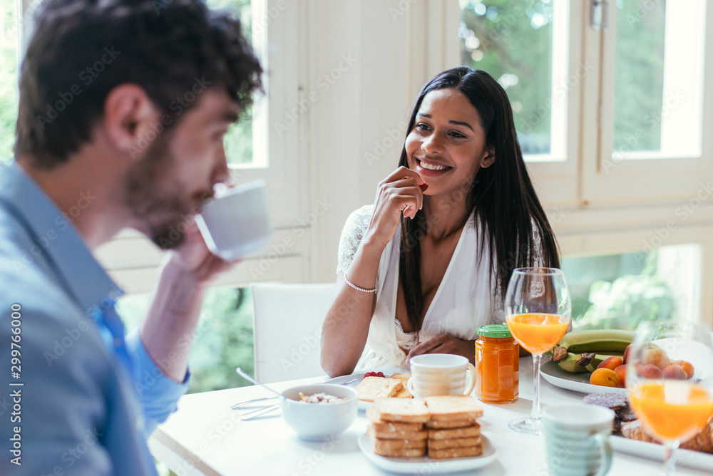 Couple in love eating breakfast in the morning