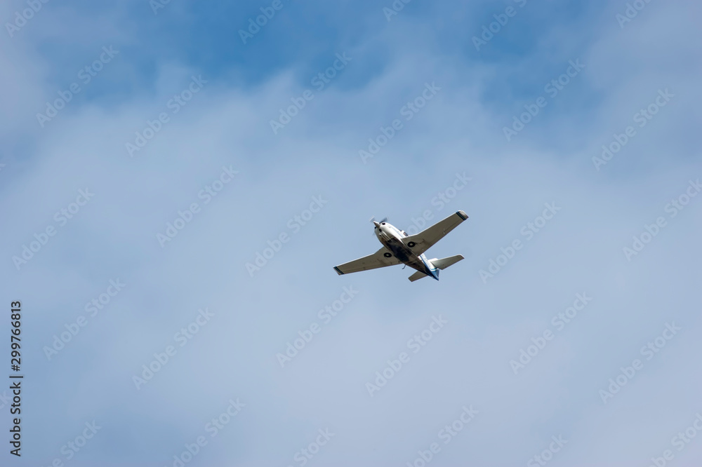 Screw plane against the blue sky. Flying lessons in dreams and in reality. Piloting small aircraft. Screw plane against the blue sky. Flying lessons in dreams and in reality. Piloting small aircraft.