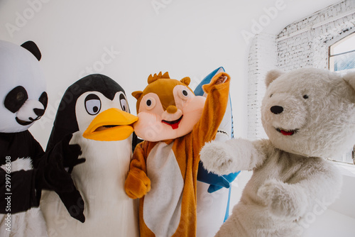 Group of animals mascots doing party photo