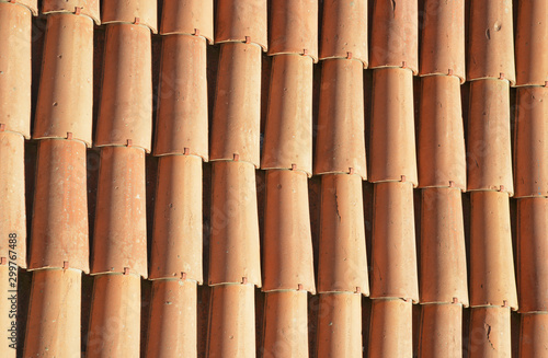 roof with red tiles on background