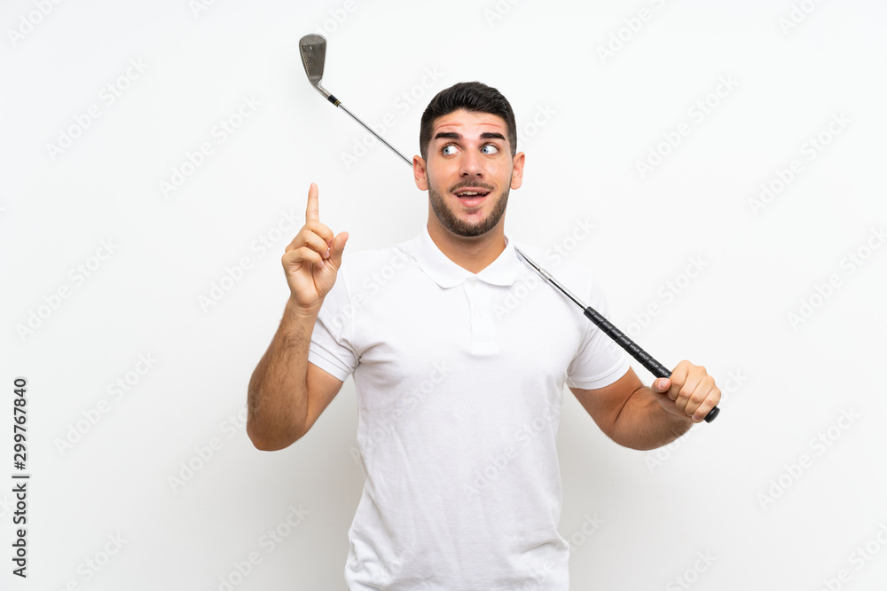 Handsome young golfer player man over isolated white background intending to realizes the solution while lifting a finger up Handsome young golfer player man over isolated white background intending to realizes the solution while lifting a finger up