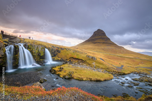 Incredible Nature landscape of Iceland. Fantastic picturesque sunset over Majestic Kirkjufell (Church mountain) and waterfalls. Kirkjufell mountain, Iceland. Famous travel locations..