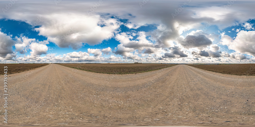 full seamless spherical hdri panorama 360 degrees angle view on gravel road among fields in autumn day with beautiful clouds in equirectangular projection, ready for VR AR virtual reality content