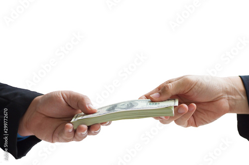 The hands of a businessman giving money to each other on a white and isolated background.