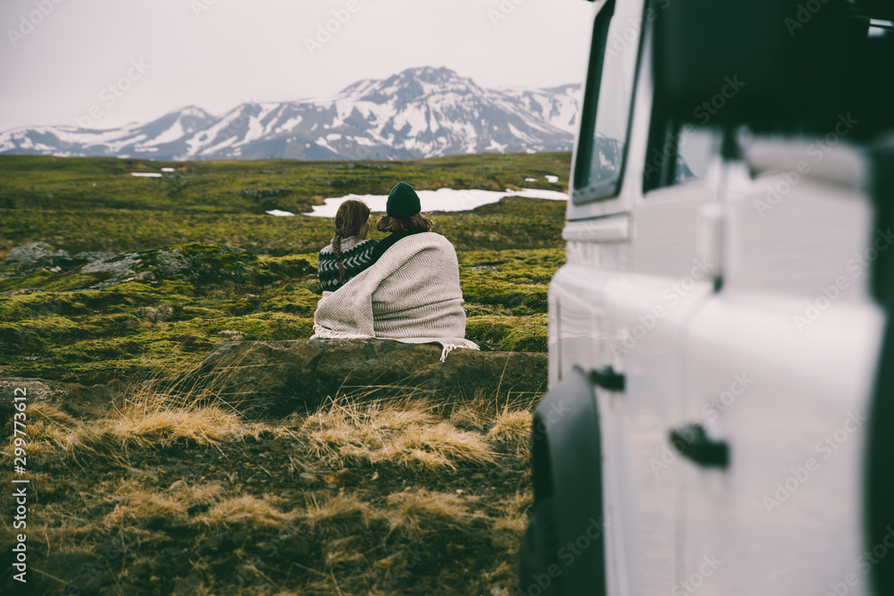 Couple making a wanderlust vacation, exploring iceland with their 4x4 jeep - obrazy, fototapety, plakaty 