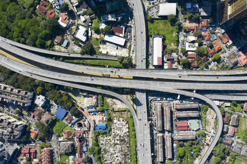 Obraz na płótnie View from above, stunning aerial view of Kuala Lumpur city with a busy road intersection. Kuala Lumpur commonly known as KL, is the national capital and largest city in Malaysia. w salonie