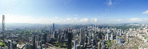 Fototapeta Naklejka Na Ścianę i Meble -  View from above, stunning panoramic view of the Kuala Lumpur skyline during a cloudy day. Kuala Lumpur commonly known as KL, is the national capital and largest city in Malaysia.
