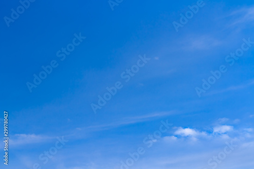 Fresh blue sky with soft and fluffy white clouds, Background for business target or meteorology or inspiration concept © Krisda