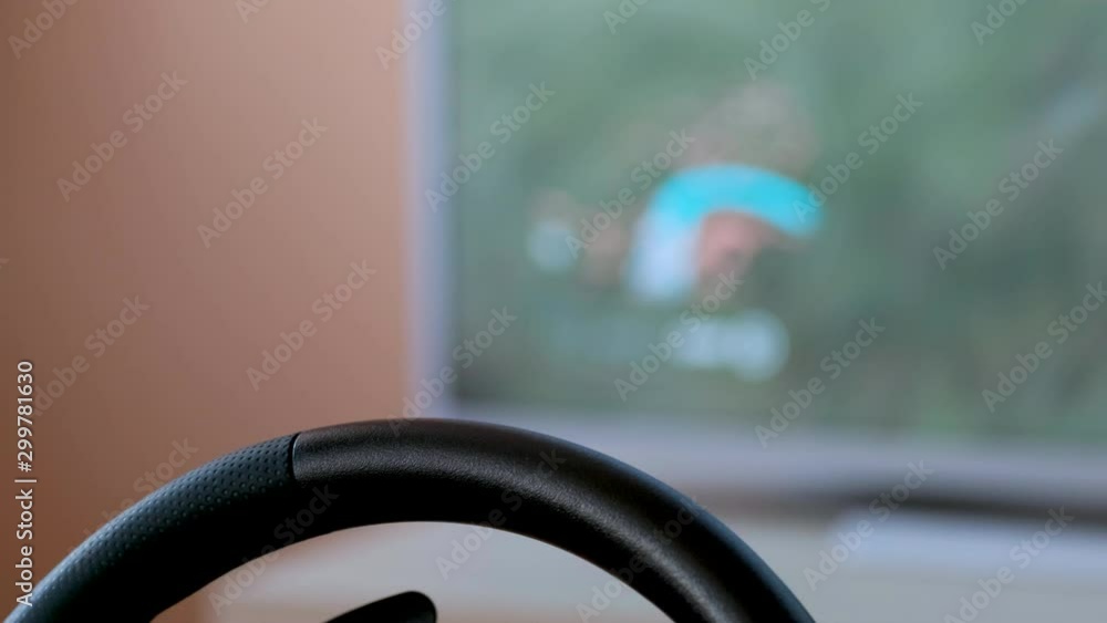 playing racing games on the game console on TV playing racing games on the game console on TV