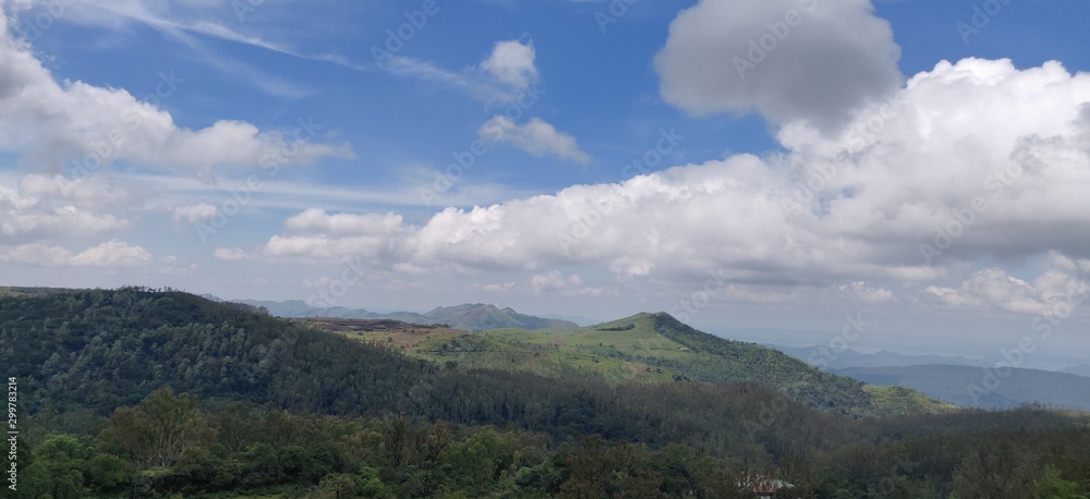 landscape with mountains and clouds