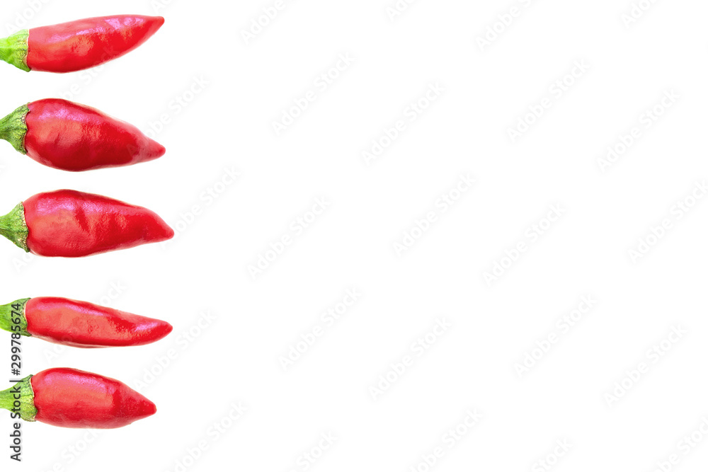 Red chilies displayed on white background with copy space Red chilies displayed on white background with copy space