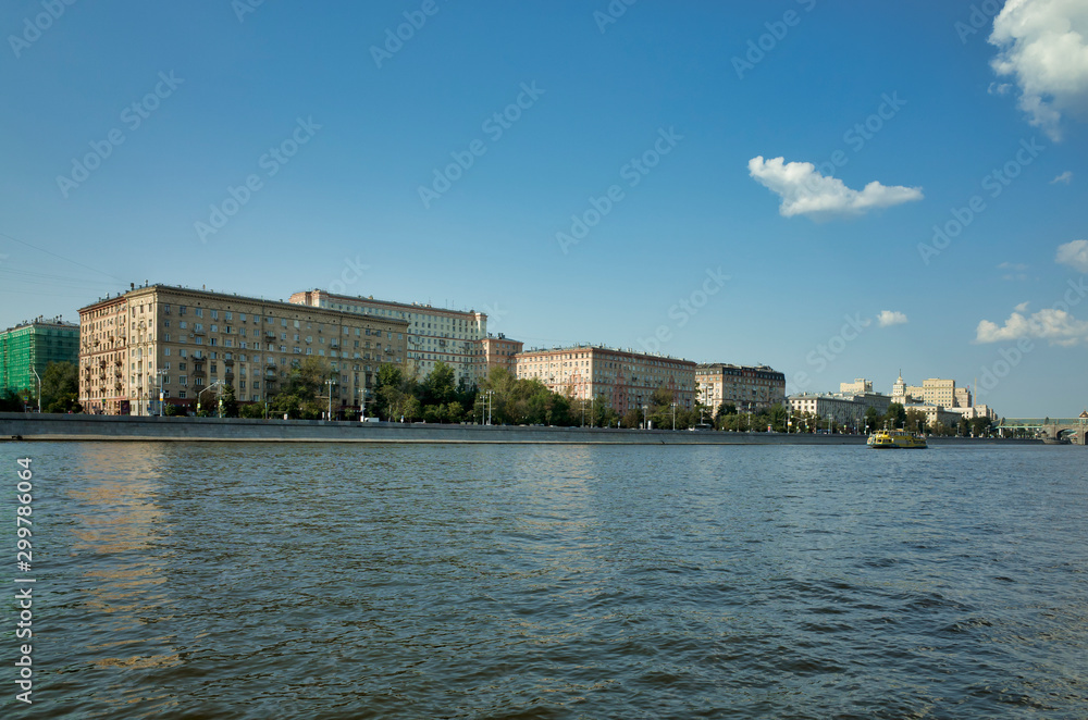 Moscow, Russia - August 20, 2017: Moscow river, view of the Frunze embankment. Pleasure tourist boats on the river