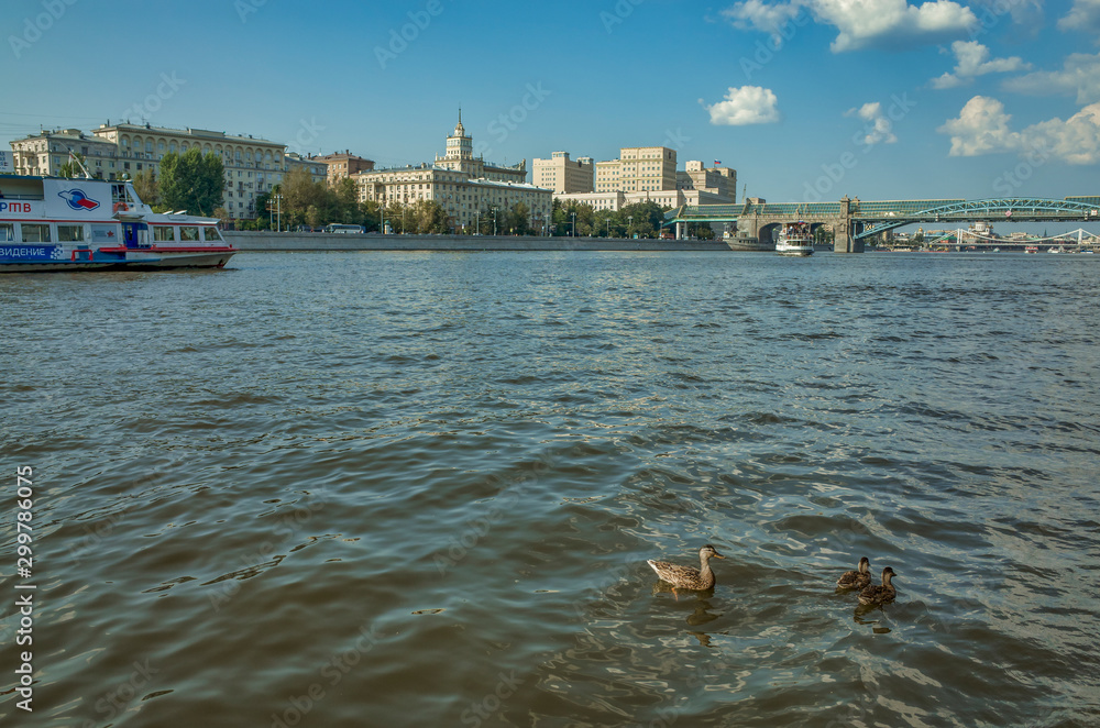 Moscow, Russia - August 20, 2017: Moscow river, view of the Frunze embankment. Pleasure tourist boats on the river