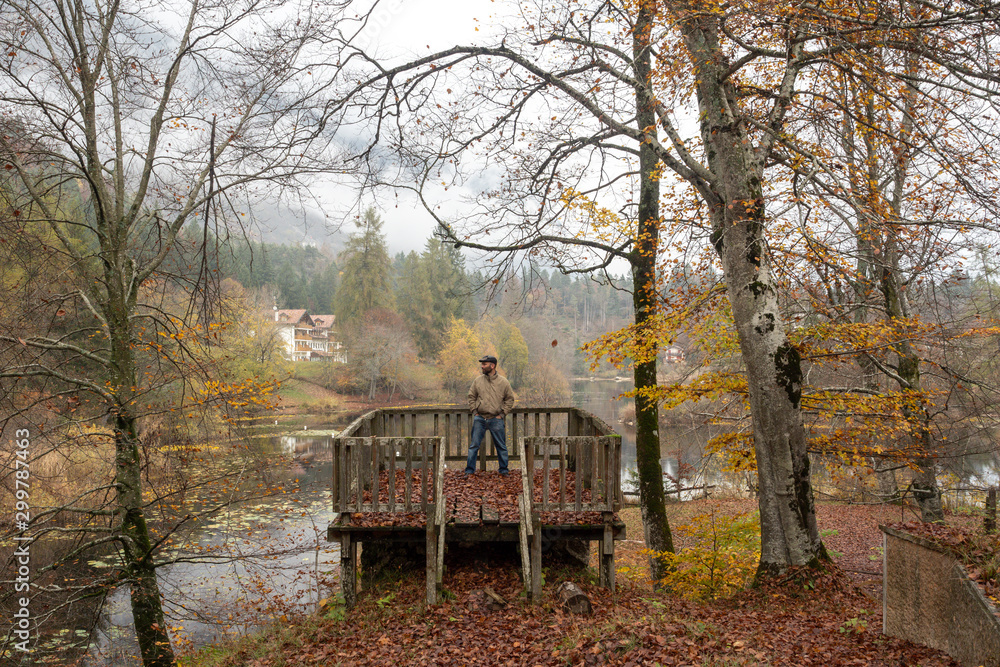 2019_11_1_Cei lake in Trentino, having a walk in the woodland in autumn season