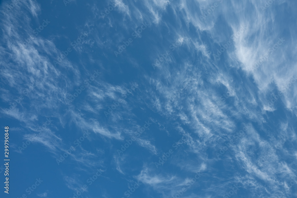 Blue sky with thin Cirrus clouds. Copy space.