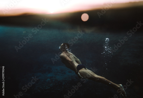 Under water photography of man photo