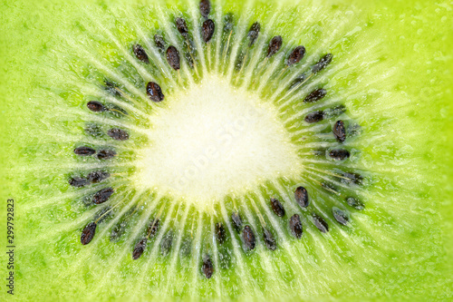 Close up, macro of the centre of a kiwi fruit showing seeds