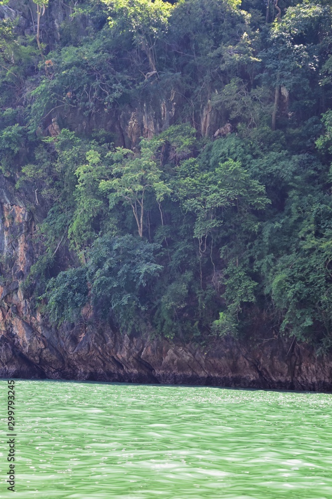 Island, Ocean views near Phuket Thailand with Blues, Turquoise and Greens oceans, mountains, boats, caves, trees resort island of phuket Thailand. Including Phi Phi, Ko Rang Yai, Ko Li Pe and other is Island, Ocean views near Phuket Thailand with Blues, Turquoise and Greens oceans, mountains, boats, caves, trees resort island of phuket Thailand. Including Phi Phi, Ko Rang Yai, Ko Li Pe and other is