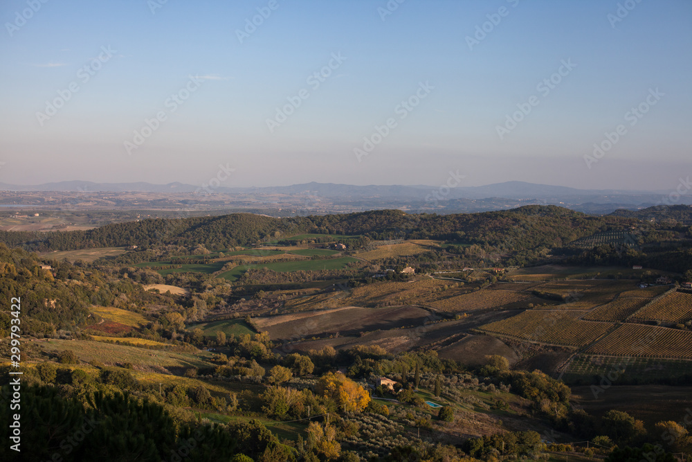 View over looking Italy valley and hills purple and blue horizon 