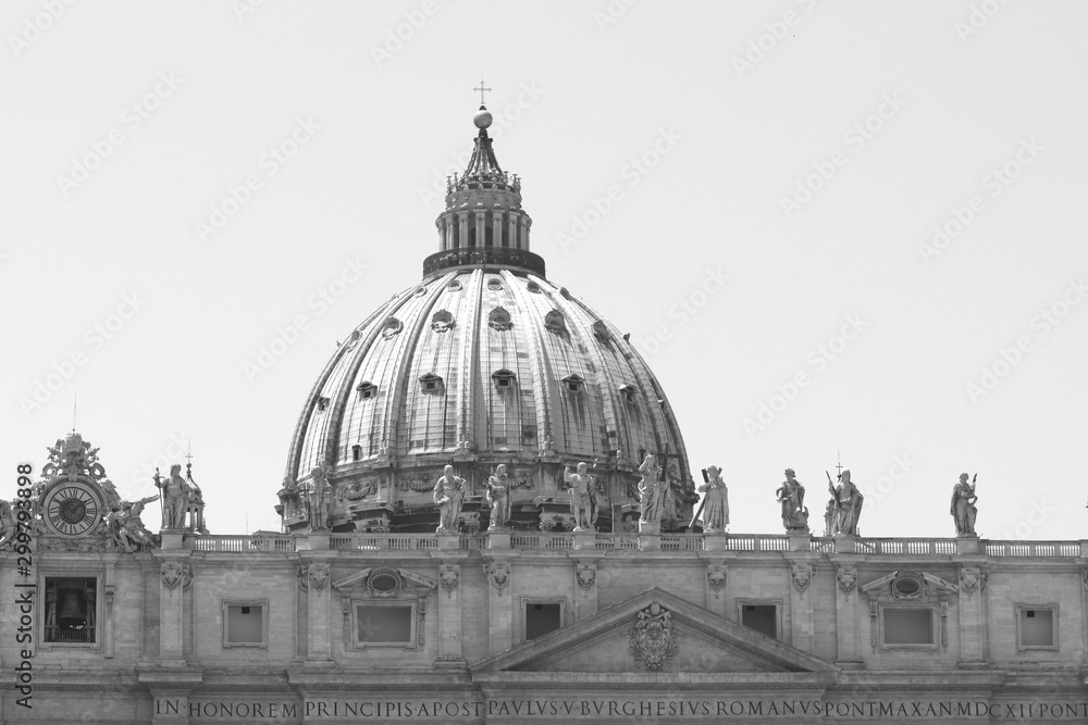 Black and white photo of Saint Peter's Basilica in St. Peter's Square, Vatican City. Vatican Museum, Rome, Italy.