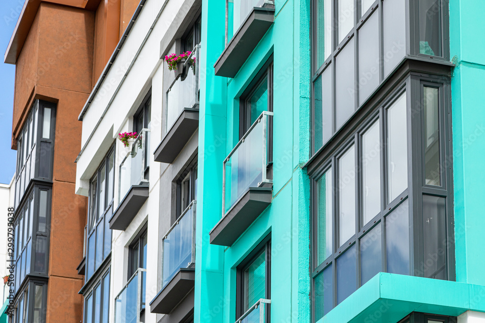 Close-up of balconies with flowers of house building Close-up of balconies with flowers of house building
