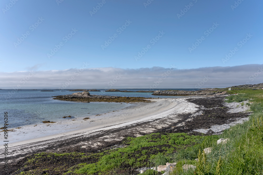 bay with white sand beach and harbor dyke, Stave , Norway