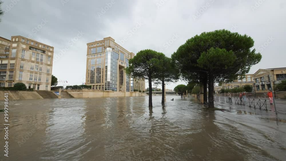 Montpellier le Lez flooded river cloudy day Antigone neighbourhood residential buildings Montpellier le Lez flooded river cloudy day Antigone neighbourhood residential buildings