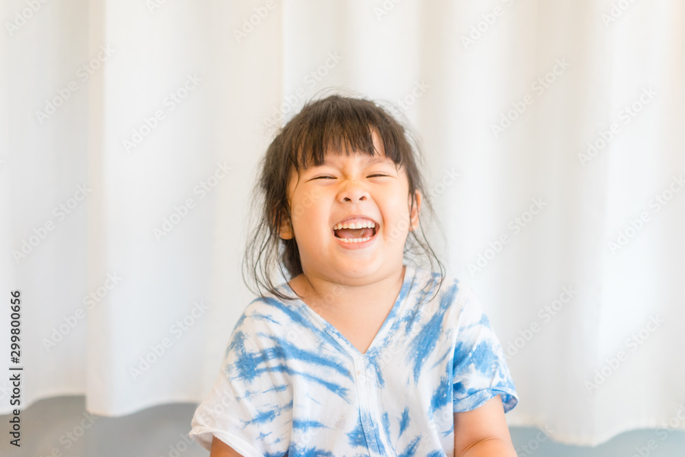 Little girl child showing front teeth with big smile: Healthy happy funny smiling face young adorable lovely female kid with new tooth dental loss: Joyful portrait of asian elementary school student Little girl child showing front teeth with big smile: Healthy happy funny smiling face young adorable lovely female kid with new tooth dental loss: Joyful portrait of asian elementary school student