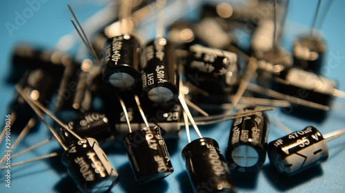 Close-up Electrolytic capacitors. Components of electronic devices, computers. Radio parts