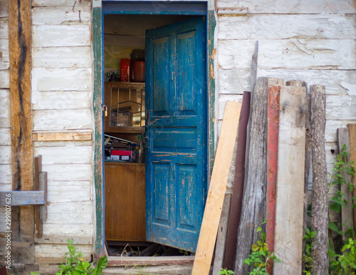 Old house with vintage blue wooden doors