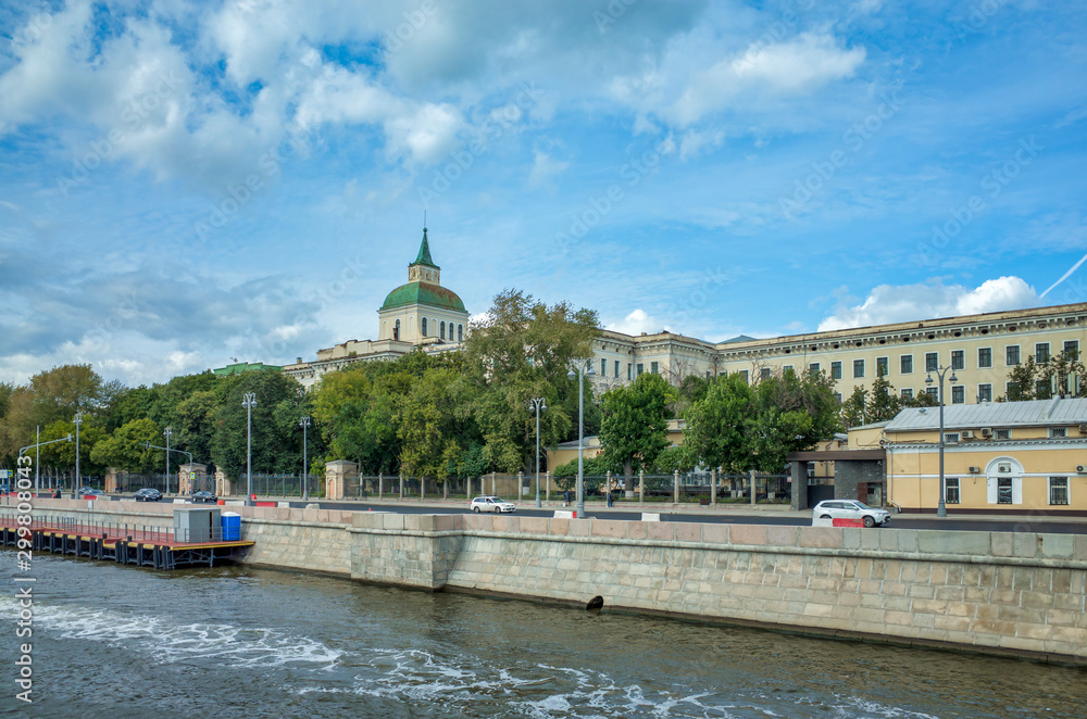 Moscow, Russia - August 27, 2017: Educational house on Moskvoretskaya embankment. Boat trip on the Moscow river