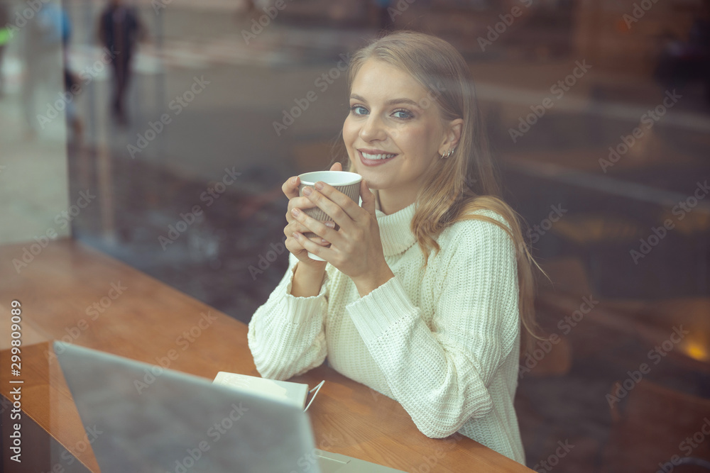 Female sitting in front of a laptop Female sitting in front of a laptop