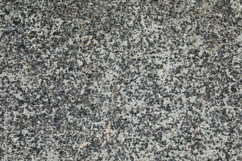 Uneven pavement of beton mixed with gravel