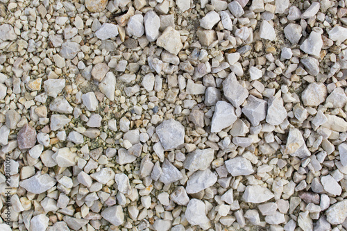 light pebbles mineral stone on beach background