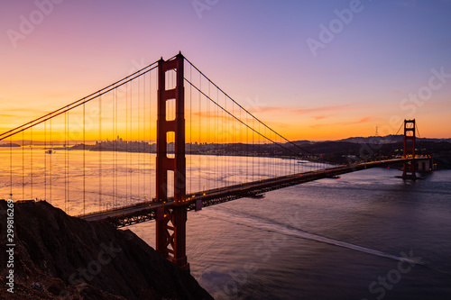 Fototapeta Naklejka Na Ścianę i Meble -  Purple Sunrise over Golden Gate Bridge and San Francisco California