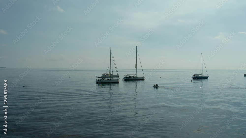 anchoring boats at the coast of Stromboli, Italy anchoring boats at the coast of Stromboli, Italy