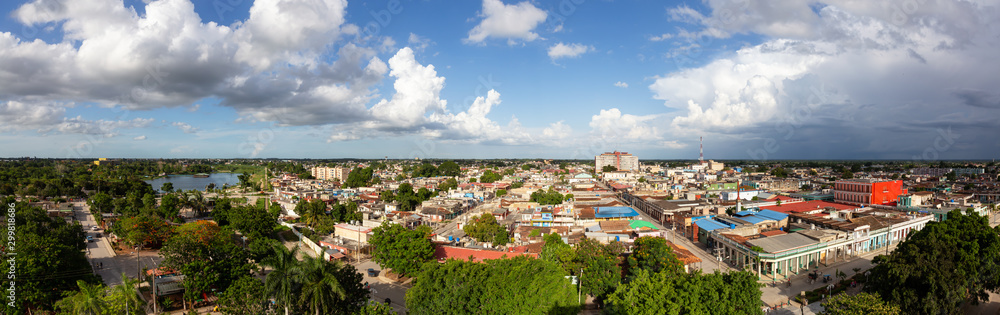 Aerial Panoramic view of a small Cuban Town, Ciego de Avila, during a cloudy and sunny evening. Located in Central Cuba.
