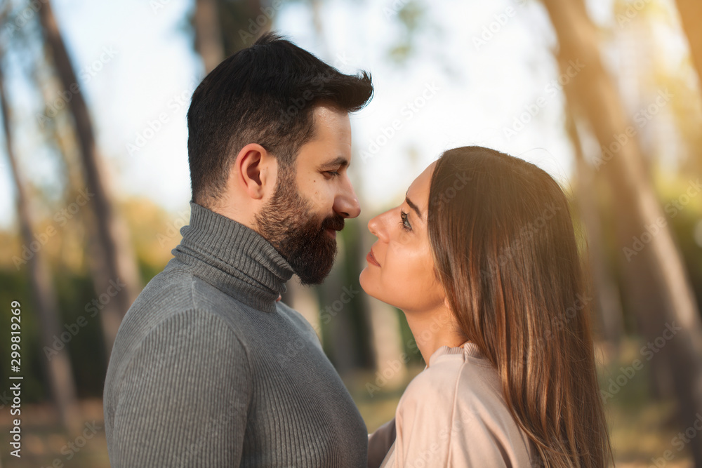 Fototapeta premium young couple looking lovingly
