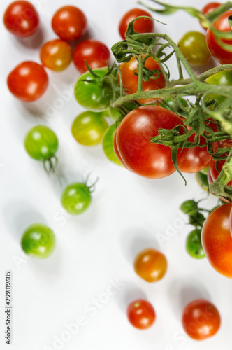 Colorful tomatoes an a white background