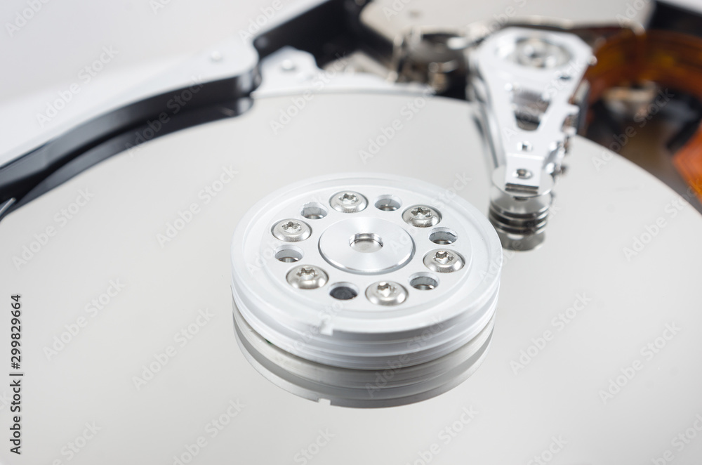 disassembled hard drive on white background, hdd, hard disk drive, close-up, head, object disassembled hard drive on white background, hdd, hard disk drive, close-up, head, object